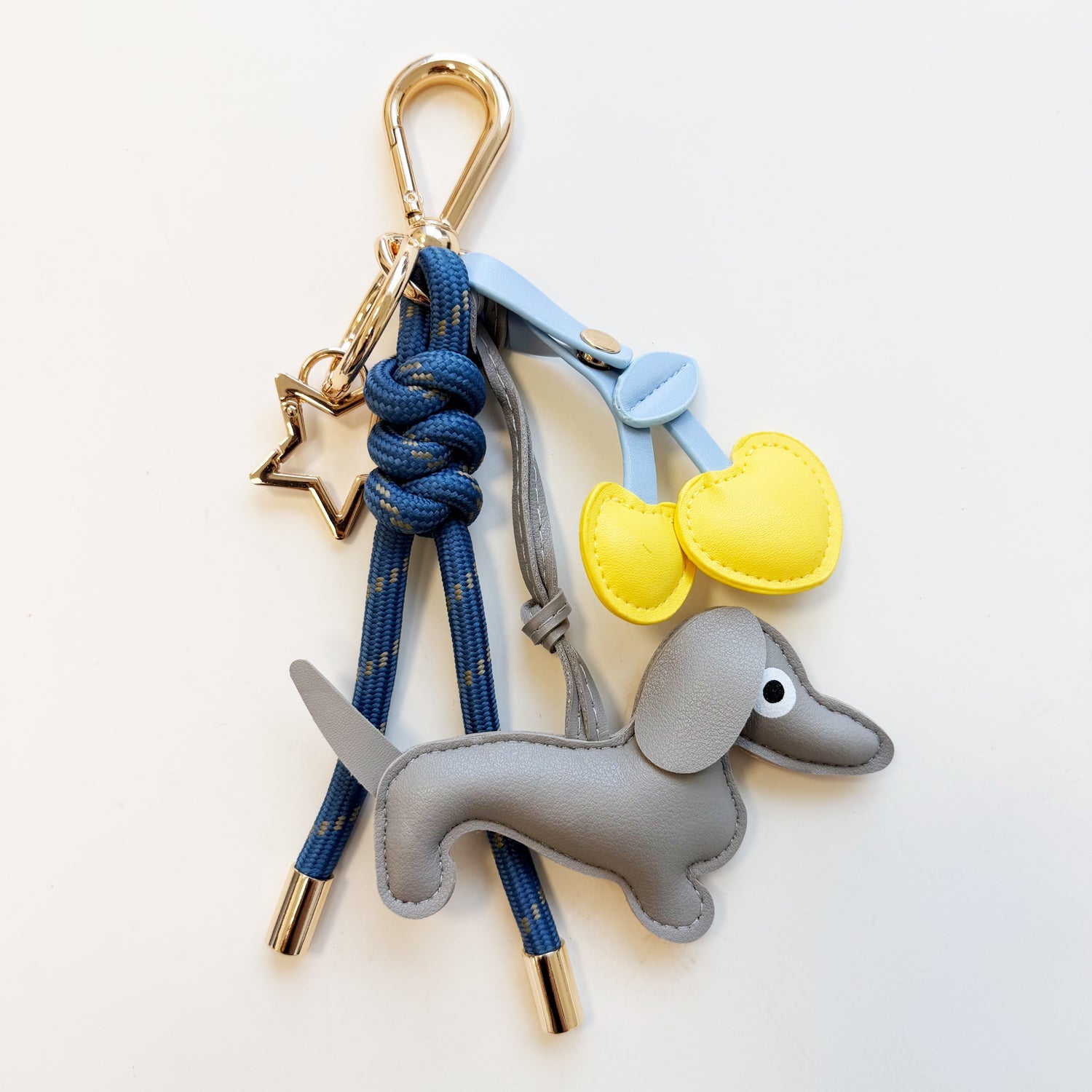 KEY CHAIN STORMY BLUE WITH CHARMS - GREY DOG AND YELLOW HEART CHERRIES