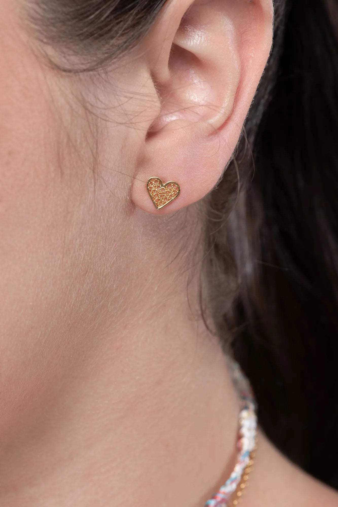 Holding Crystal Earrings
