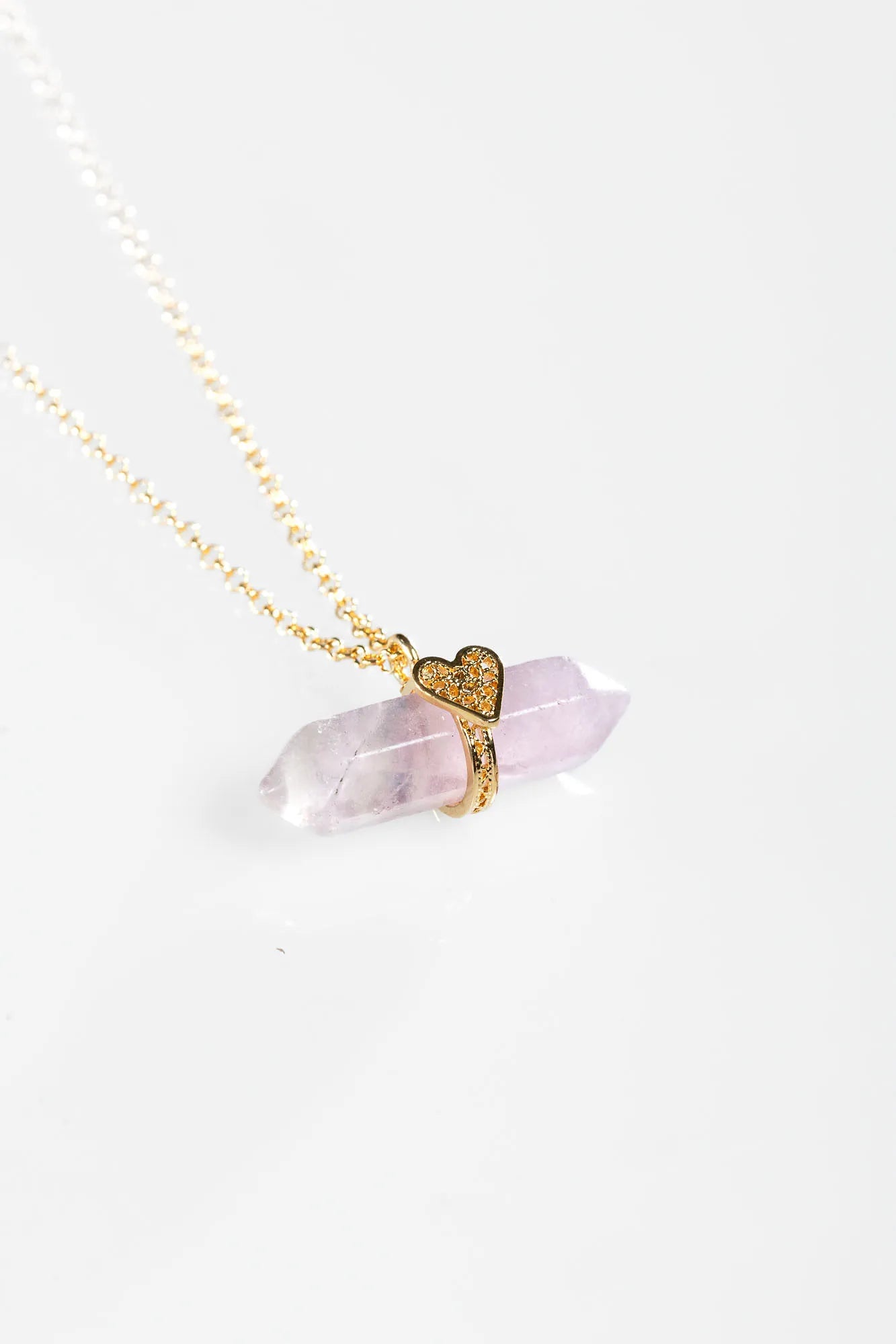 Holding Crystal Necklace