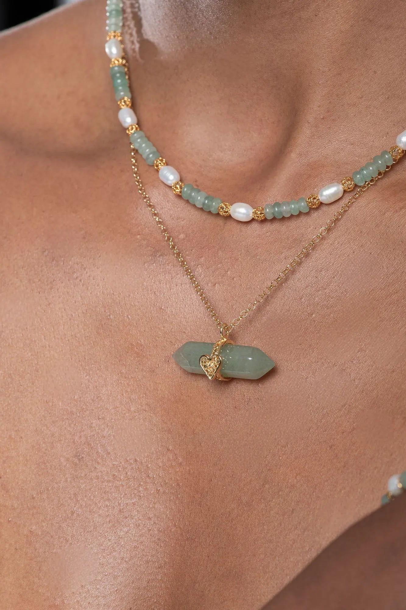 Holding Crystal Necklace
