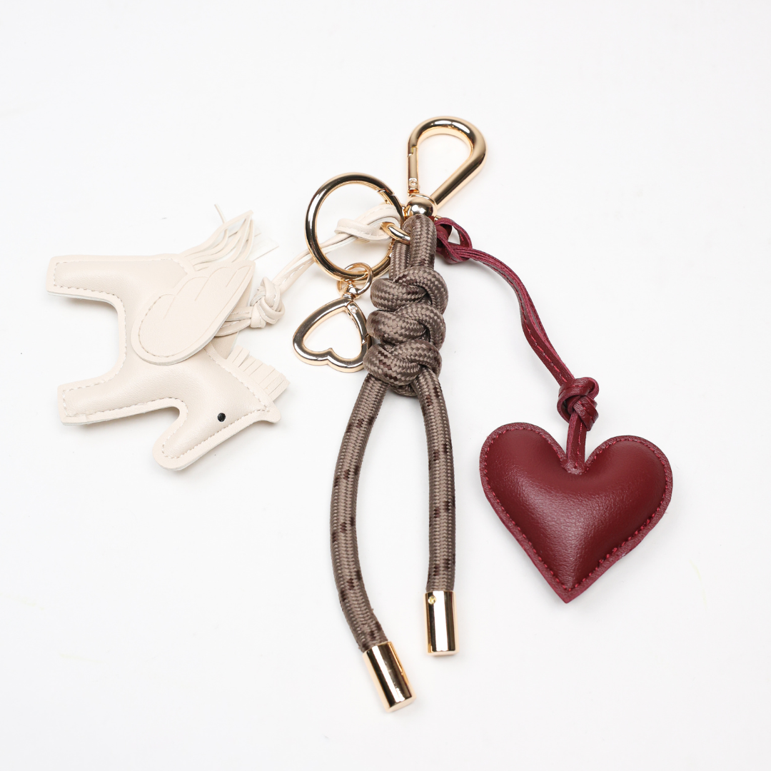 KEY CHAIN MOCHA WITH CHARMS - WHITE FLYING HORSE AND BURGUNDY HEART